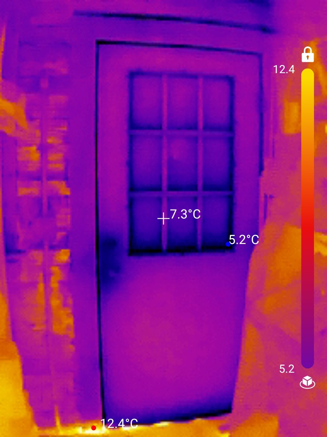 Thermal image of a door with air leaking around the edges